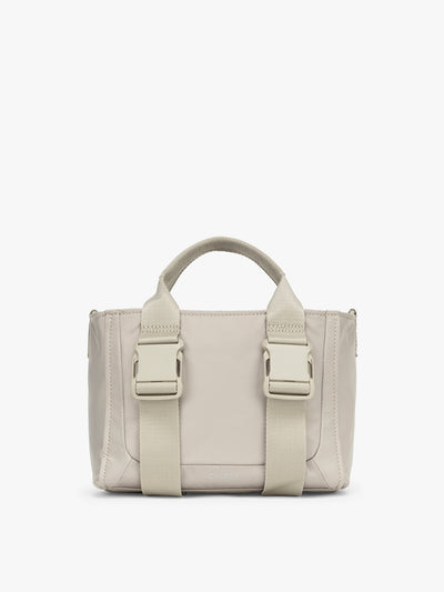 CALPAK Fit Gym Crossbody Bag in beige Greige front view with white background; ABF2601-GREIGE
