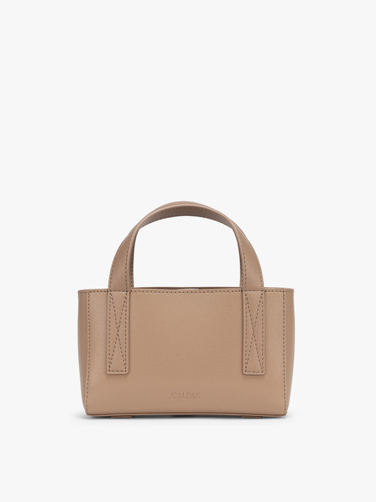 CALPAK Haven Mini Crossbody Bag in beige Taupe front view; AMC2501-TAUPE