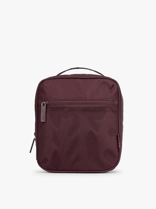 Dark burgundy Dark Cherry color of the CALPAK Everything Cube organizer with a top handle, a front zippered pocket, and a textured mesh lower panel, shown against a plain white background; ACE2401-DARK-CHERRY