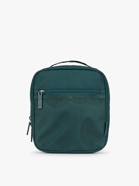 A dark teal green Kale CALPAK Everything Cube organizer with a top handle, a front zippered pocket, and a textured mesh lower panel, shown against a plain white background; ACE2401-KALE