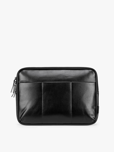 Black vegan leather CALPAK Luka 14in Laptop Sleeve with a zippered top and a front pocket, shown against a plain white background; ALL2401-BLACK-PU