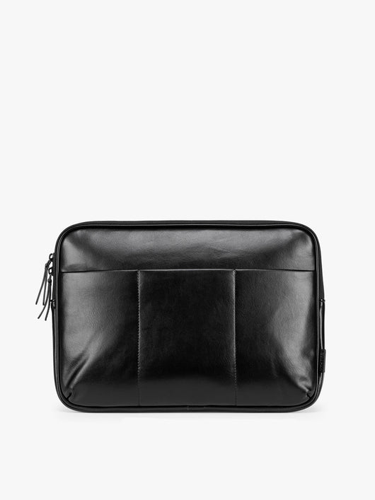 Black vegan leather CALPAK Luka 14in Laptop Sleeve with a zippered top and a front pocket, shown against a plain white background; ALL2401-BLACK-PU