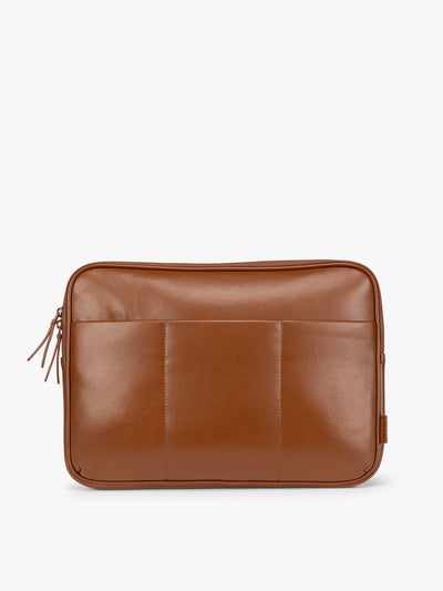 Light Honey Brown vegan leather CALPAK Luka 14in Laptop Sleeve with a zippered top and a front pocket, shown against a plain white background; ALL2401-HONEY-BROWN-PU