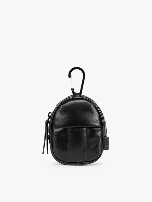 A small Black CALPAK Luka Backpack Zip Bag Charm leather backpack keychain with a top carabiner and zipper pull, shown on a plain white background; AMB2201-BLACK-PU