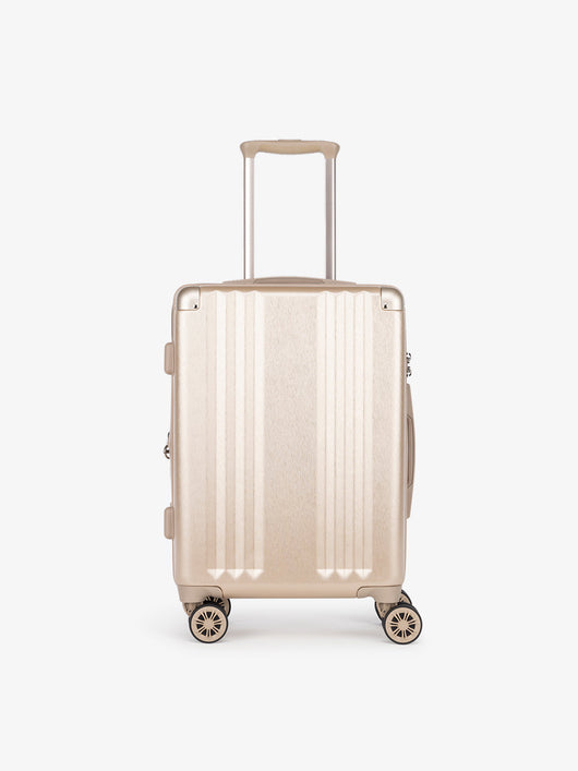 Lightweight gold CALPAK Ambeur 22-inch rolling spinner carry-on luggage with TSA lock; LAM1020-GOLD