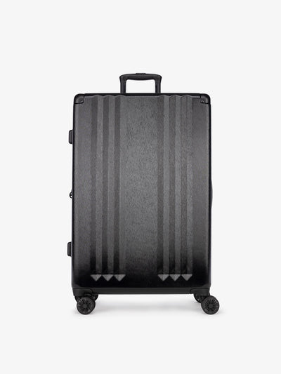 Studio product shot of front-facing CALPAK Ambeur large 30-inch black hardshell spinner luggage; LAM1028-BLACK