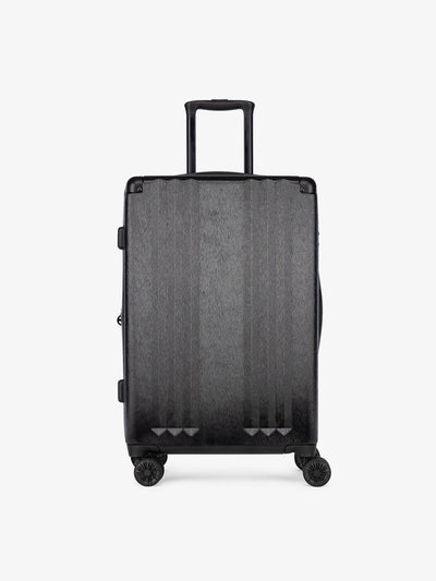 Studio product shot of front-facing CALPAK Ambeur black medium 26-inch lightweight hardshell rolling luggage; LAM1024-BLACK