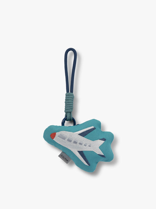 CALPAK Kids Pluffy Bag Charm white Airplane on blue plush front view; APLF2501-AIRPLANE