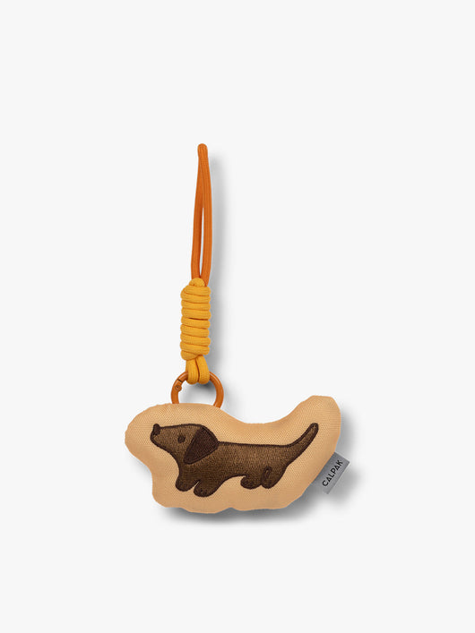 CALPAK Kids Pluffy Bag Charm brown Dog on tan plush front view; APLF2501-DOG