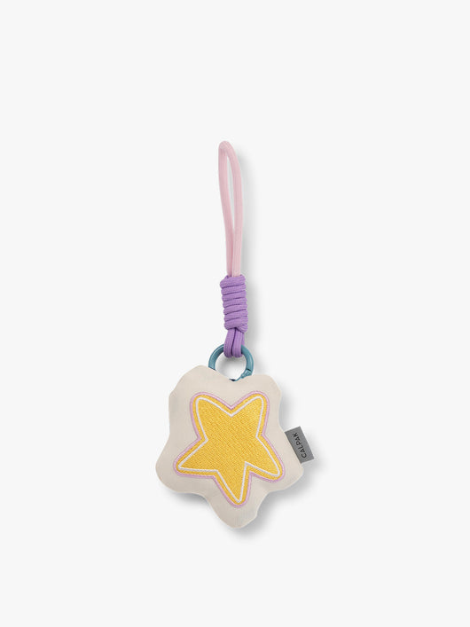 CALPAK Kids Pluffy Bag Charm yellow Star on white plush front view; APLF2501-STAR