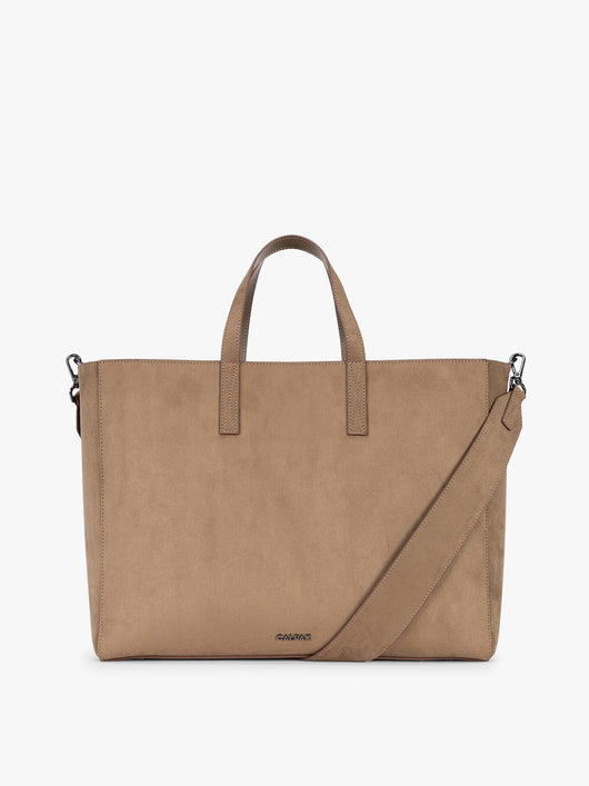 A CALPAK Haven 16" Laptop Tote in Truffle Suede taupe brown tote bag with dual top handles and a matching adjustable shoulder strap, shown against a plain white background; ATO2102-TRUFFLE-FAUX-SUEDE