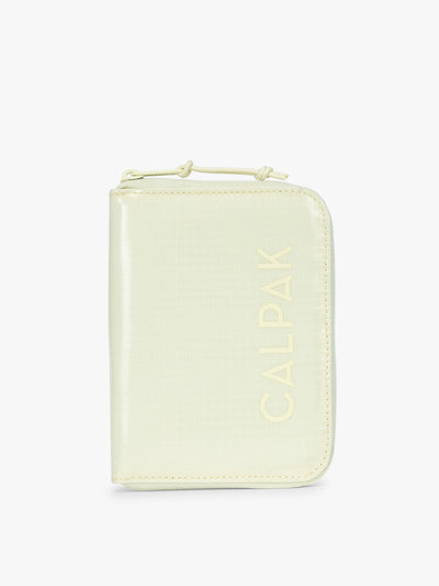 Front side of CALPAK Terra Zip Passport Wallet in light green Celadon; ATPW2501-CELADON