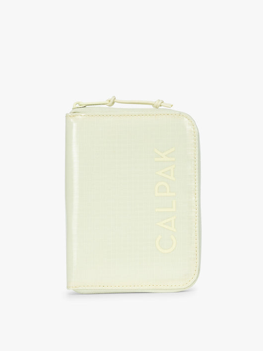 Front side of CALPAK Terra Zip Passport Wallet in light green Celadon; ATPW2501-CELADON