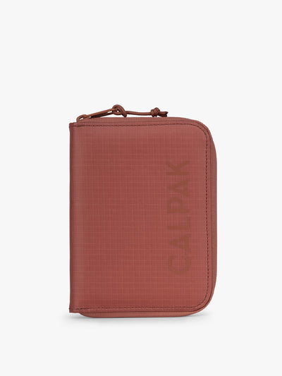 CALPAK Terra Zip Passport Wallet in red-orange Clay; ATPW2501-CLAY