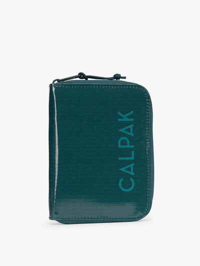  CALPAK Terra Zip Passport Wallet in blue green Kale on a white background; ATPW2501-KALE
