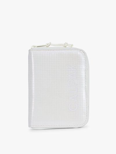 Front side of CALPAK Terra Zip Passport Wallet in shiny white Moonbeam; ATPW2501-MOONBEAM