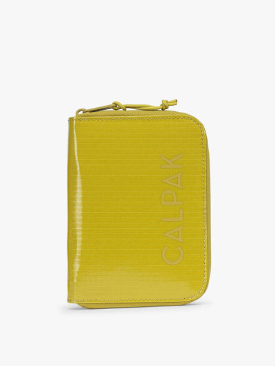  CALPAK Terra Zip Passport Wallet in yellow green Wasabi on a white background; ATPW2501-WASABI