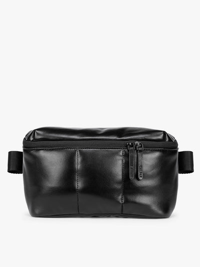 Black vegan leather CALPAK Luka Belt Bag with a zippered front pocket and side straps, shown against a plain white background; BB1901-BLACK-PU