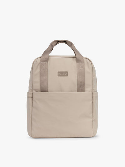 CALPAK Connect Laptop Backpack in grey beige Greige front view with a white background; BCN2401-GREIGE