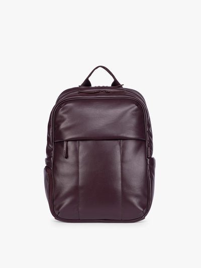 CALPAK Dark Cherry Luka 15 inch Laptop Backpack in vegan leather with a glossy finish, featuring a top carry handle, a main zippered compartment, and a front slip pocket, shown against a plain white background; BPL2001-DARK-CHERRY-PU