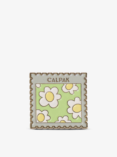 Front-view of CALPAK Stamp Enamel Pin with daisy print; CPP2401-STAMP