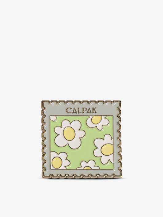Front-view of CALPAK Stamp Enamel Pin with daisy print; CPP2401-STAMP