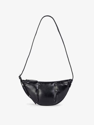 Black vegan leather Luka Crescent shoulder bag with a long thin strap, shown against a plain light gray background; CBL2601-BLACK-PU