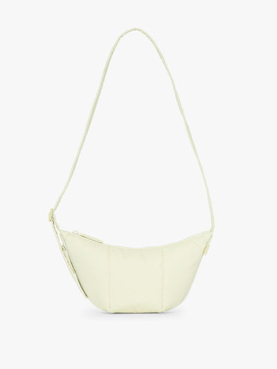 CALPAK Luka Crescent Tote bag in light green Celadon with shoulder strap and bag is expandable up to 2" on a white background; CBL2601-CELADON