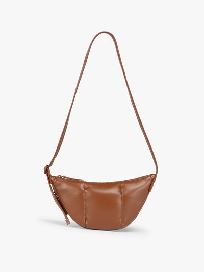 Honey Brown vegan leather Luka Crescent shoulder bag with a long thin strap, shown against a plain light gray background; CBL2601-HONEY-BROWN-PU