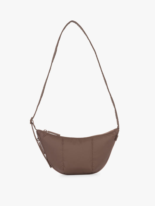 CALPAK Luka Crescent Tote bag in brown Walnut with shoulder strap and bag is expandable up to 2" on a white background; CBL2601-WALNUT