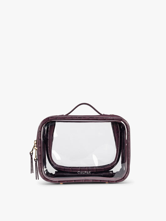 CALPAK Small Clear Cosmetics Case that is a transparent pouch with a deep red Dark Cherry in crocodile-embossed; CCM2001-DARK-CHERRY-FAUX-CROC