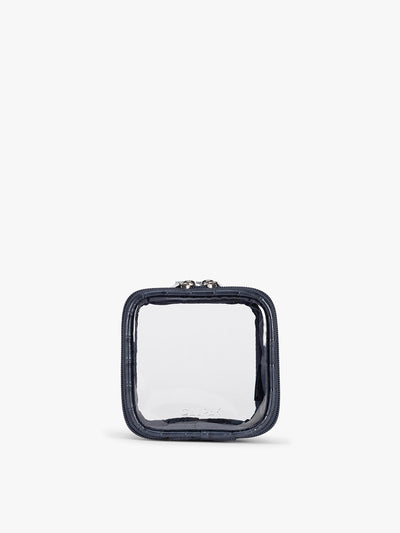 CALPAK Tiny Clear Cosmetics Case that is a transparent pouch with a dark navy blue in crocodile-embossed; CCT2501-NAVY-FAUX-CROC