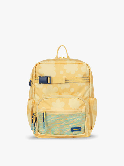 CALPAK Kids Small Backpack in yellow with tan flower print in Yellow Bloom for ages 3-5 is built for your little one’s big days with yellow zippers and blue mesh front pocket, multiple interior pockets for an 11” tablet or laptop, and padded comfort straps; CKBS2501-YELLOW-BLOOM