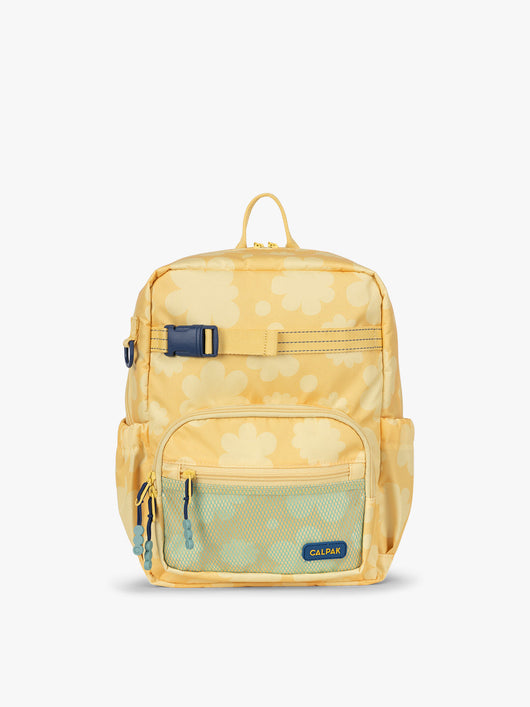 CALPAK Kids Small Backpack in yellow with tan flower print in Yellow Bloom for ages 3-5 is built for your little one’s big days with yellow zippers and blue mesh front pocket, multiple interior pockets for an 11” tablet or laptop, and padded comfort straps; CKBS2501-YELLOW-BLOOM