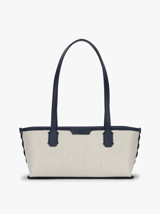 CALPAK Colette Canvas Shoulder Tote in beige canvas material  and blue finishing; CLST2601-NATURAL-NAVY