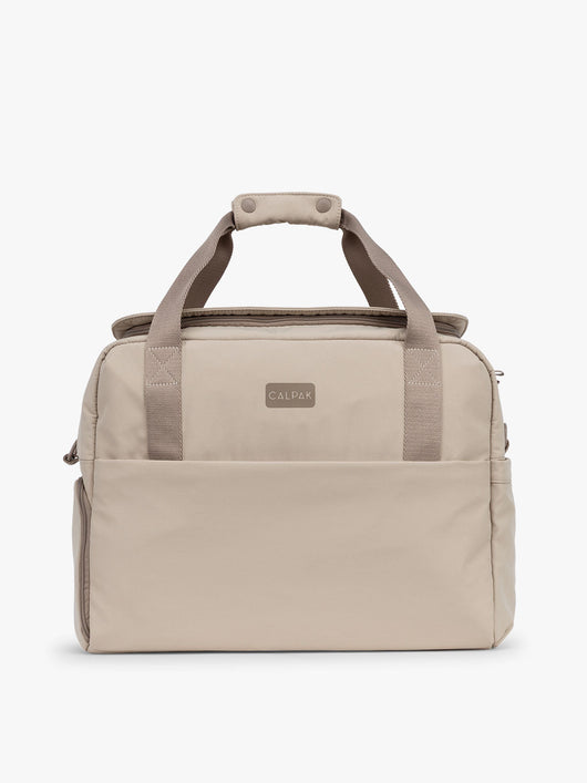 CALPAK Laptop Duffel in beige Greige front view with white background; DCN2401-GREIGE