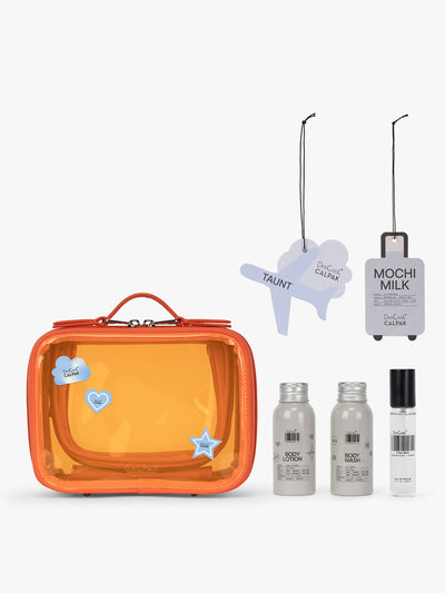 CALPAK x Dedcool Collaboration of the Small Clear Cosmetic Case in orange Papaya with toiletry items and perfumes; CCM2001-DEDCOOL