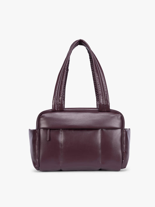 Dark burgundy Dark Cherry vegan leather CALPAK Luka Mini Duffel with dual top handles and side pockets, photographed against a clean white background; DLM2501-DARK-CHERRY-PU