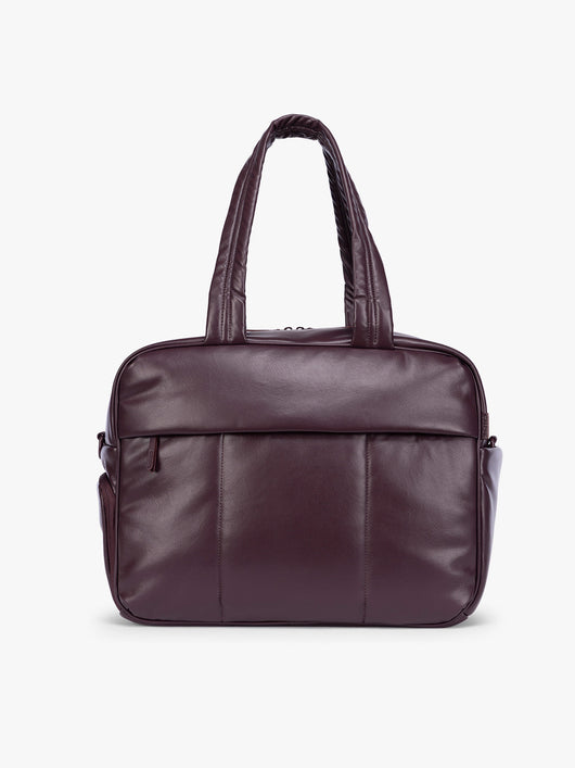 A dark burgundy CALPAK Luka Duffel in vegan leather with dual top handles and a front zippered pocket, photographed against a clean white background; DSM1901-DARK-CHERRY-PU
