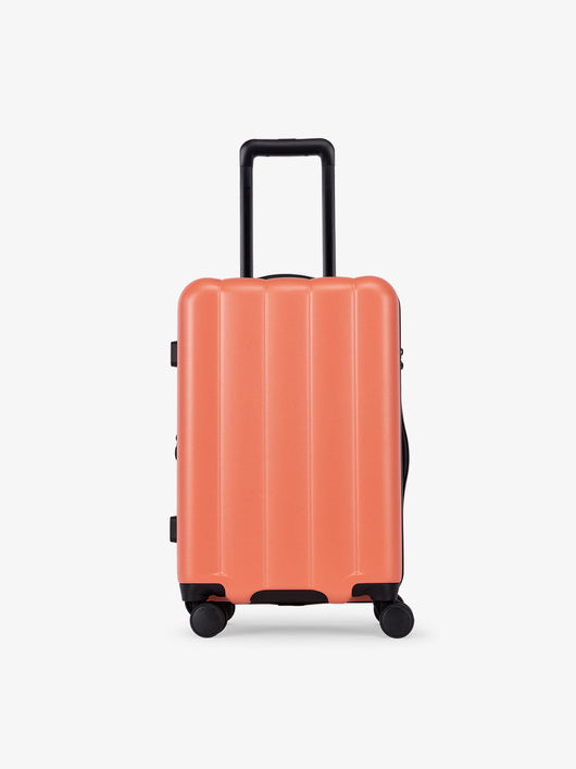 CALPAK Pacific blue carry-on luggage made from an ultra-durable polycarbonate shell and expandable by up to 2" in persimmon; LCO1020-PERSIMMON