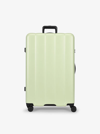 CALPAK daisy large luggage made from an ultra-durable polycarbonate shell and expandable by up to 2"; LCO1028-DAISY