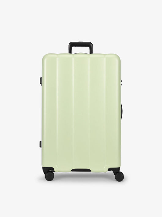 CALPAK daisy large luggage made from an ultra-durable polycarbonate shell and expandable by up to 2"; LCO1028-DAISY