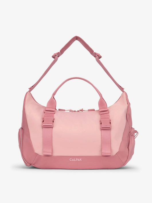 Front view of CALPAK Fit gym duffel bag made with recycled, water resistant material in tea rose; TBF2401-TEA-ROSE, TBF2401-TEA-ROSE-GRIN, BTBF2401-TEA-ROSE