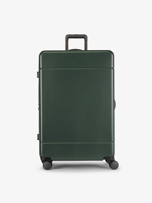 CALPAK Hue Large 30 inch hard shell Luggage front view in green Emerald; LHU1028-EMERALD