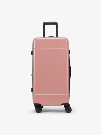 CALPAK Hue Medium Trunk Luggage with durable hard-shell exterior, cushioned top handle and 360 spinner wheels in mauve; LHU1026-MAUVE