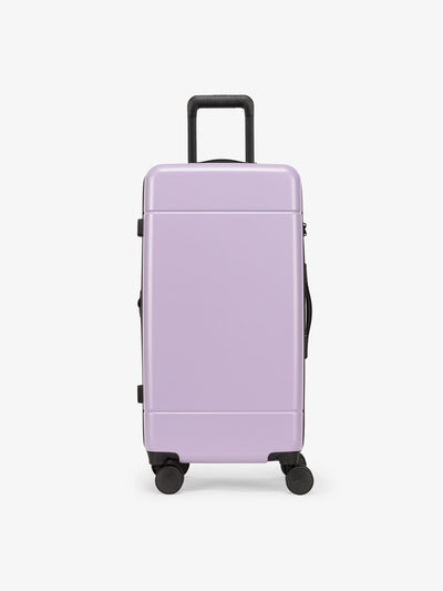 CALPAK Hue Medium Trunk Luggage with durable hard-shell exterior, cushioned top handle and 360 spinner wheels in orchid; LHU1026-ORCHID