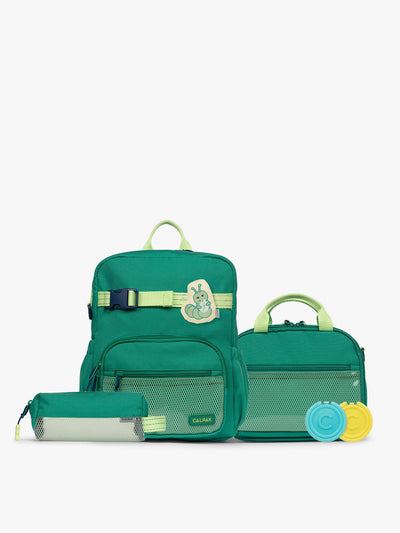Green CALPAK Kids Small Essentials Bundle that includes backpack and lunch bag, and pencil case light gray background; BCKS5000-GREEN