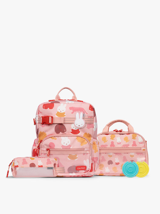 Colorful CALPAK + Miffy Kids Essentials Set with children's Small backpack, lunch bag , pencil case set on a white background with pink accents and Miffy with other animals; BCKS5000-MIFFY-PINK-ZOO-TRIP
