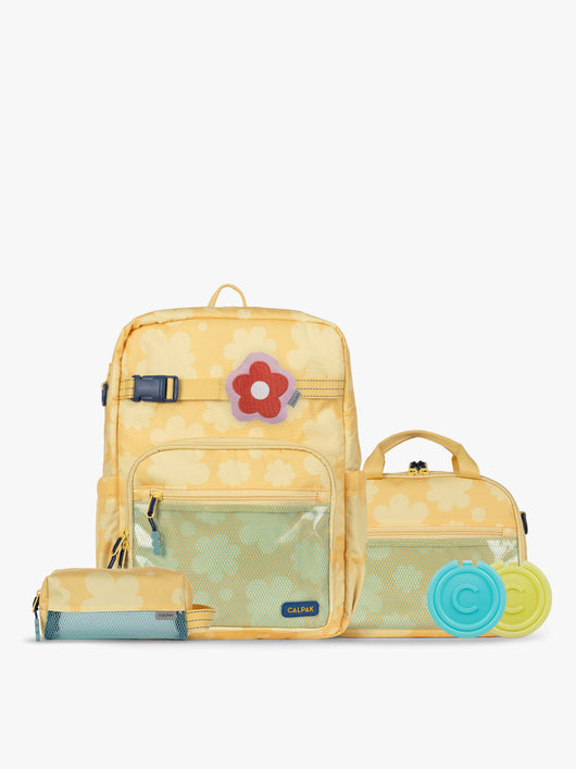 CALPAK Kids Collection Large Kids Backpack Bundle in yellow flower print Yellow Bloom that includes Kids Lunch Bag, Kids Pencil Case, red and pink Flower Pluffy Bag Charm, and Set of 2 Ice Packs; BCKL5000-YELLOW-BLOOM