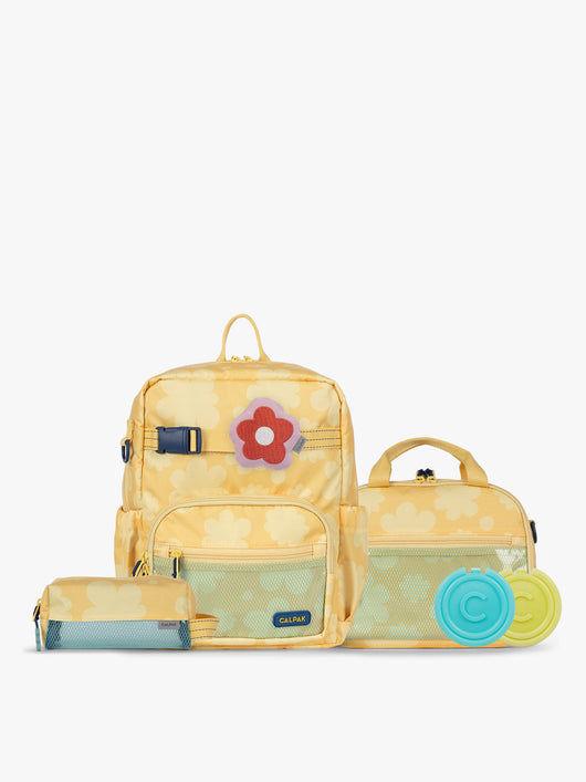 CALPAK Kids Collection Small Kids Backpack Bundle in yellow flower print Yellow Bloom that includes Kids Lunch Bag, Kids Pencil Case, red and pink Flower Pluffy Bag Charm, and Set of 2 Ice Packs; BCKS5000-YELLOW-BLOOM